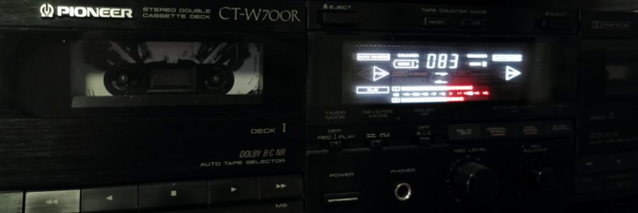 The tape being played in a cassette deck