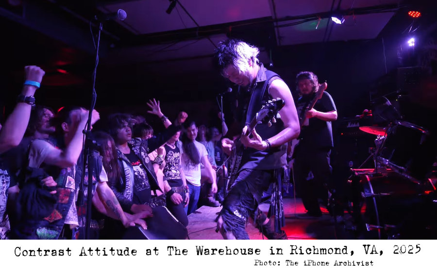 A live photo of Contrast Attitude from The Warehouse, Richmond, VA in 2025. The audience to the left is enjoying themselves and the band to the right are playing. The drummer is just out of shot.