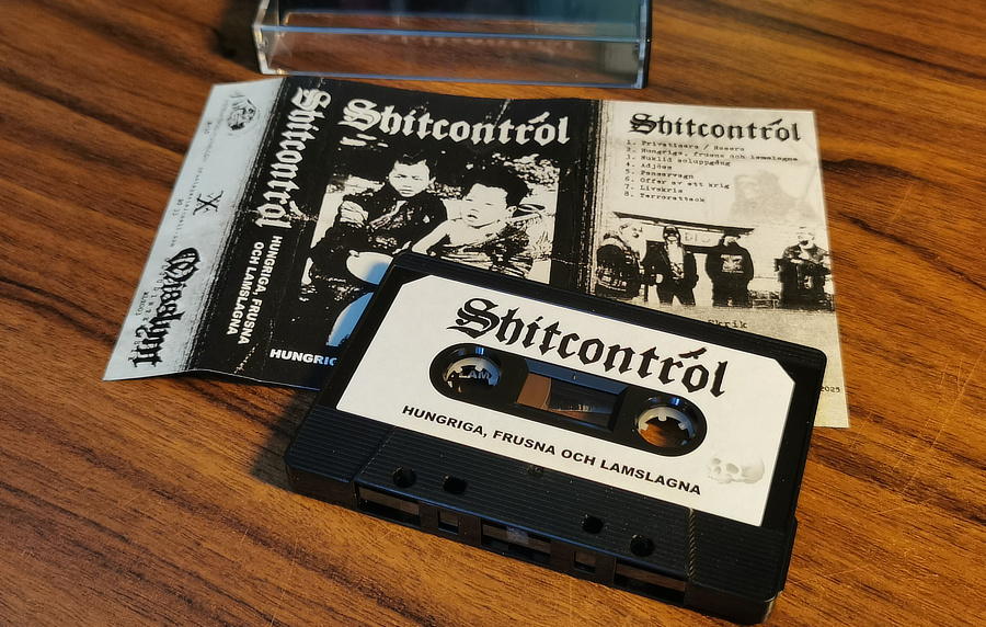 The tape laying on the unfolded j-card